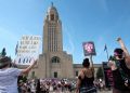 Nebraska ballot will include competing measures to expand or limit abortion rights, top court rules