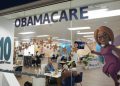 Share of Americans with insurance falls despite record Obamacare enrollment