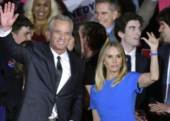 Cheryl Hines sells products with naked RFK Jr. showering behind her