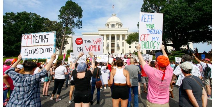 Judge rules Alabama can’t prosecute people who help women travel for abortions