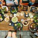 Is dining with others a sign of happiness?