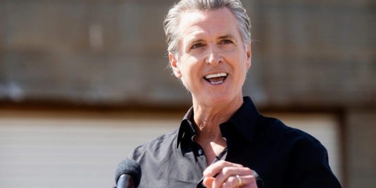 Newsom eyes pause in migrant health care program’s expansion