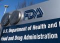 FDA’s top drug regulator resigns amid conduct probe, is sued by drug company