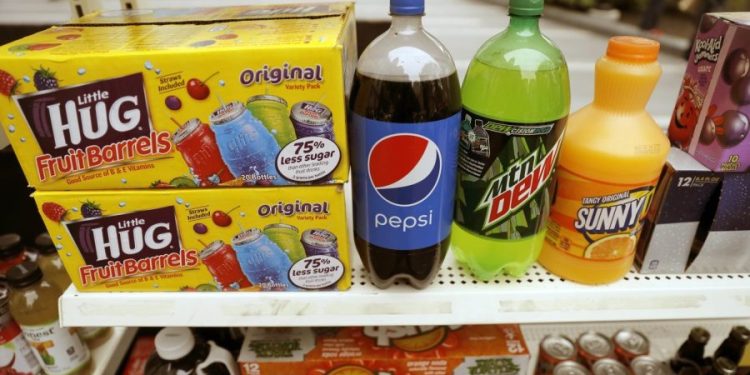 WHO calls for higher taxes on alcohol, sugary drinks