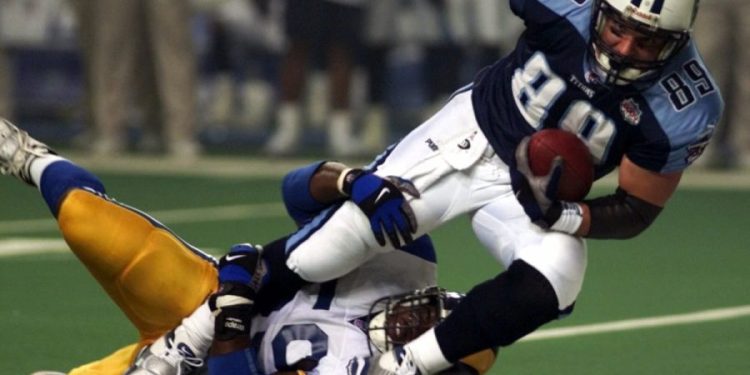 What is CTE, and how many former NFL players have been diagnosed with it?
