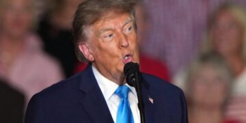 Trump brushes question off about handing out cash before election